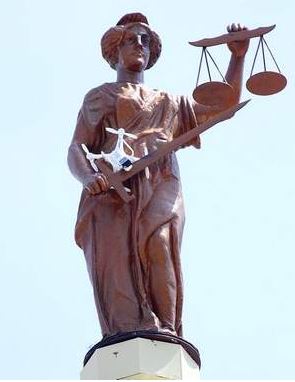 Lady Justice “catches” a quad